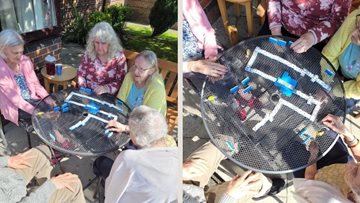 Bolton care home Residents compete in dominoes tournament